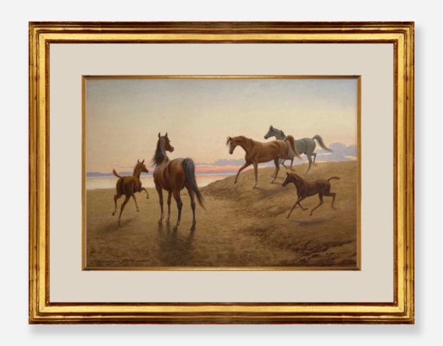 Arabian Horses and foals in a coastal landscape