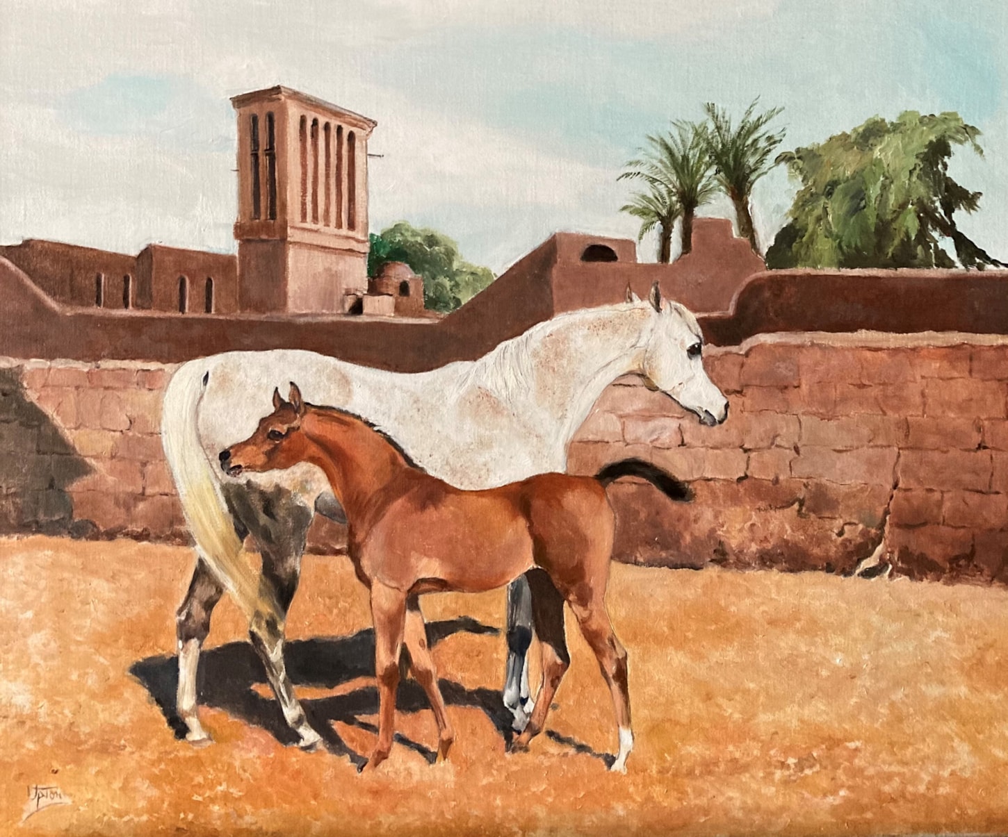 Fleabitten mare with a grey colt
